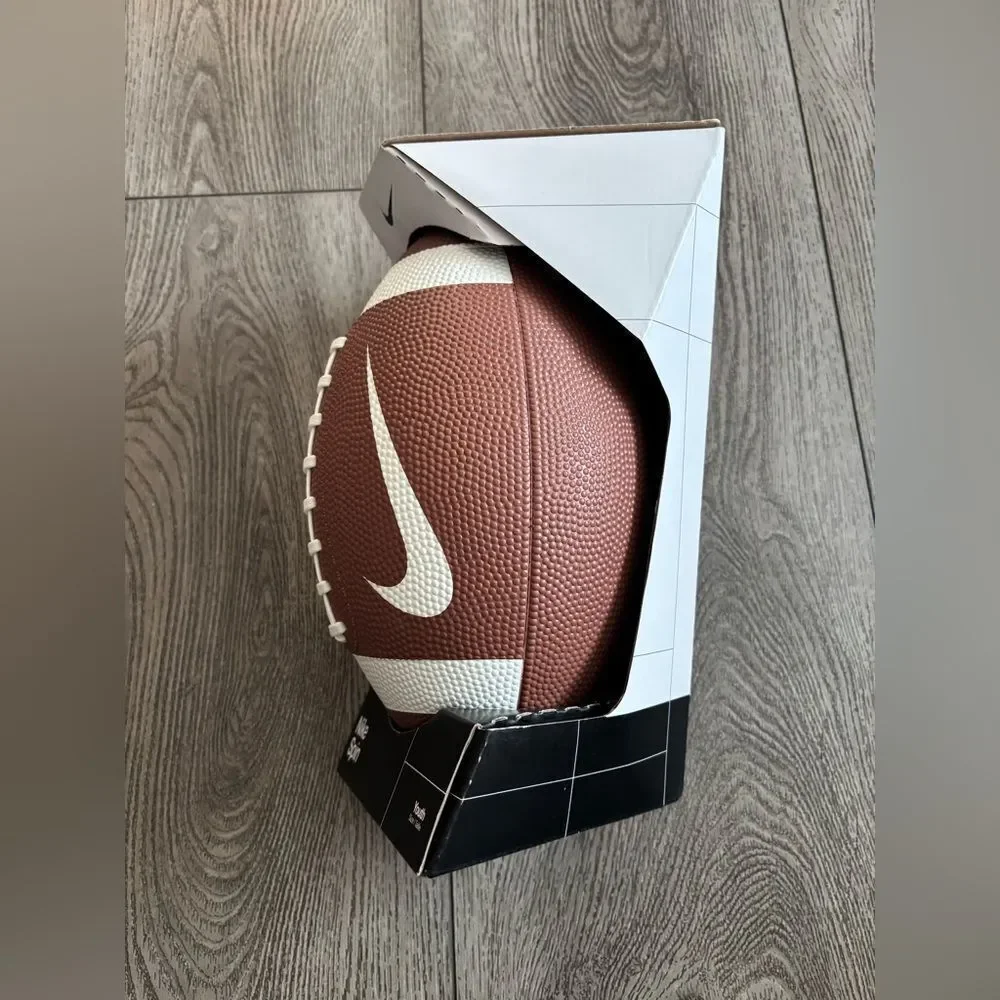 Nike brown and white Precision Football